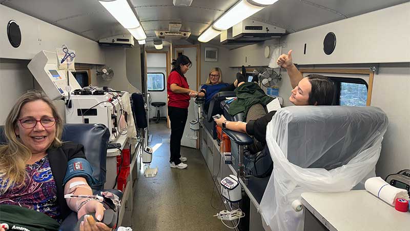 Abberly Green team members help with a blood drive for American Red Cross